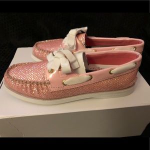 Pink Sperry Topsider boat shoes with sparkles.